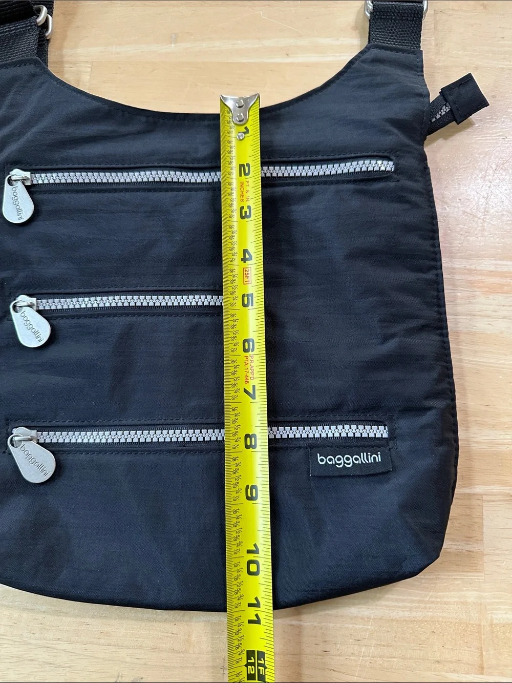 Baggallini Black Crossbody Sling with Silver Zippers